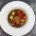 Kaspressknödel mit Kürbis serviert als Kaspressknödelsuppe